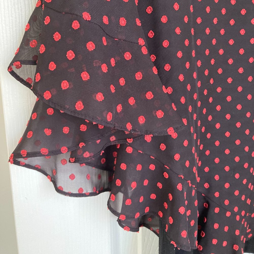 I.N. San Francisco black top with ruffled overlay and red dots